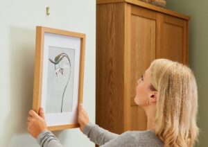 How to Hang a Frame on The Wall: 6 Tips and Tricks